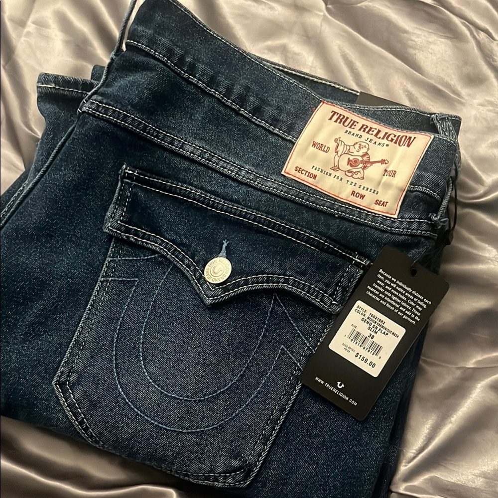True Religion Dark Blue Jeans with Curved Stitching and Light Stitching